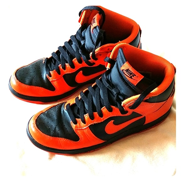 black and orange nike high tops